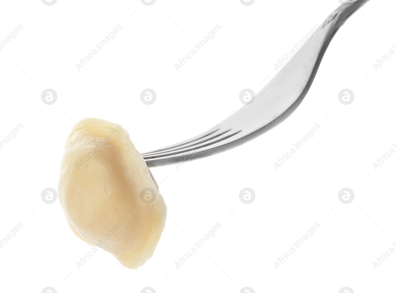 Photo of Fork with tasty dumpling isolated on white