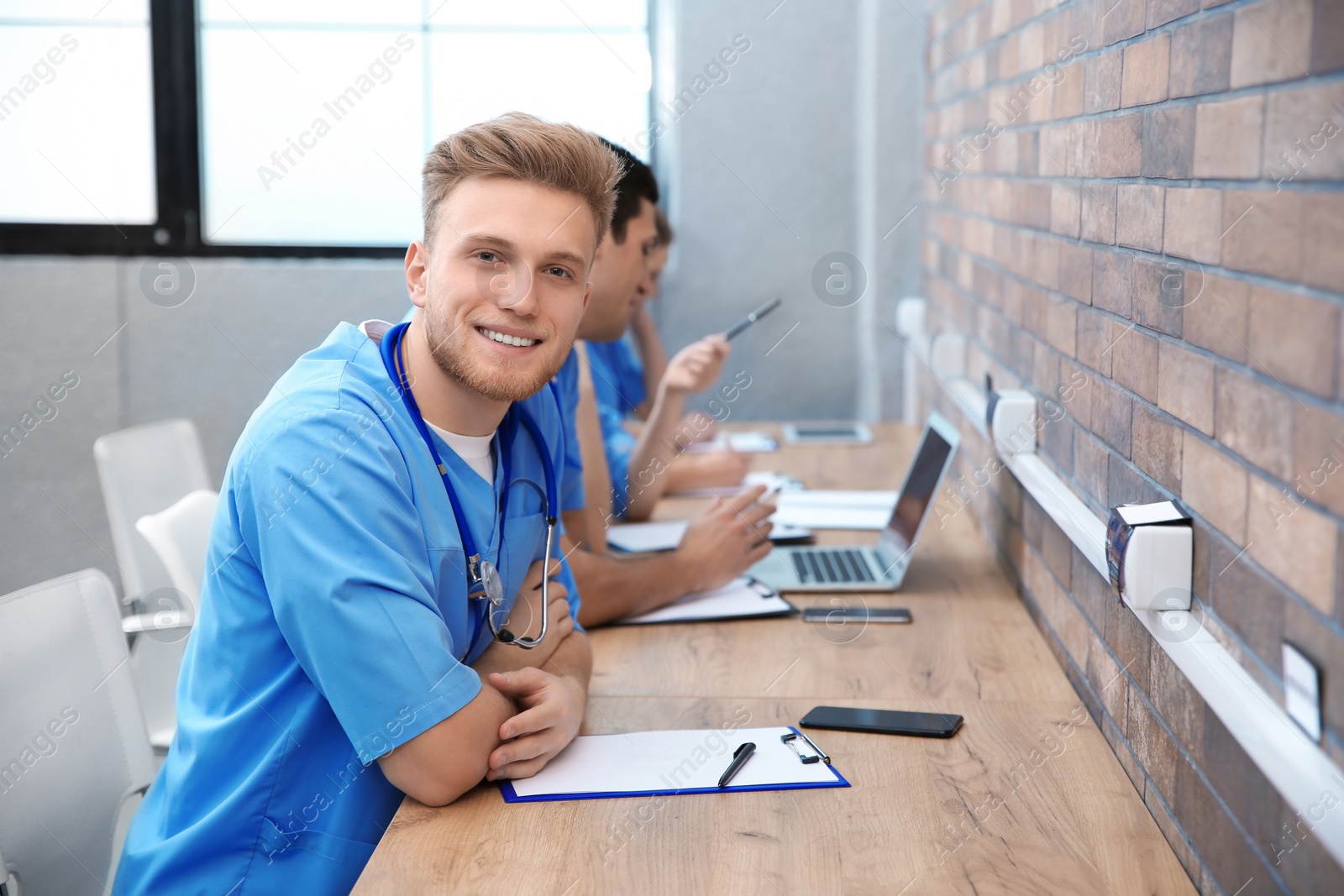 Photo of Medical student with groupmates studying in university