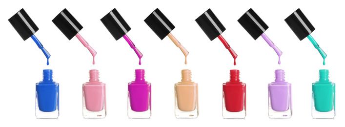 Image of Setdifferent nail polishes dripping on white background. Banner design