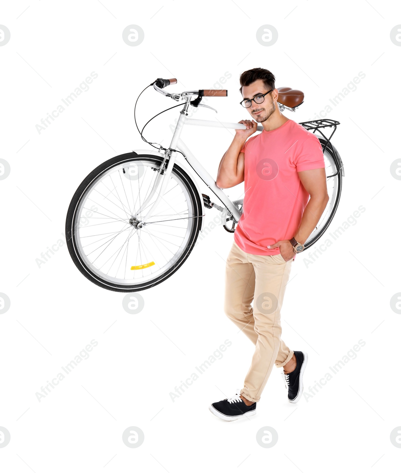 Photo of Handsome young hipster man with bicycle on white background