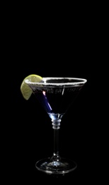 Photo of Glass of delicious cocktail on black background