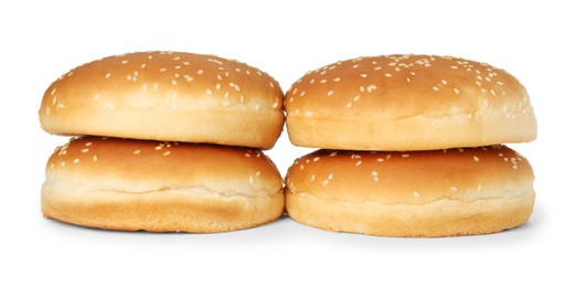 Photo of Many fresh hamburger buns isolated on white