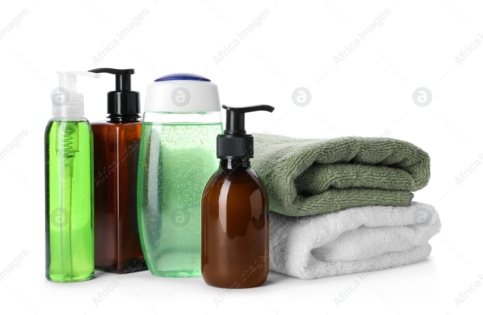 Photo of Personal hygiene products and towels on white background