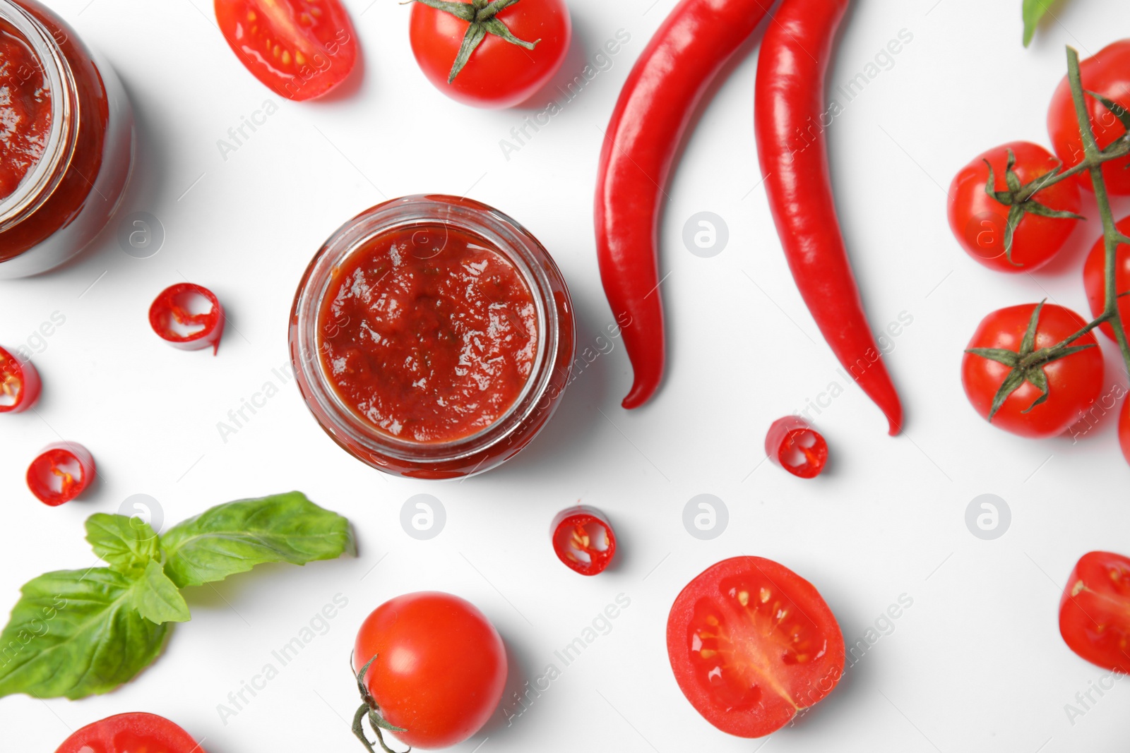 Photo of Composition with tasty homemade tomato sauce on white background, top view