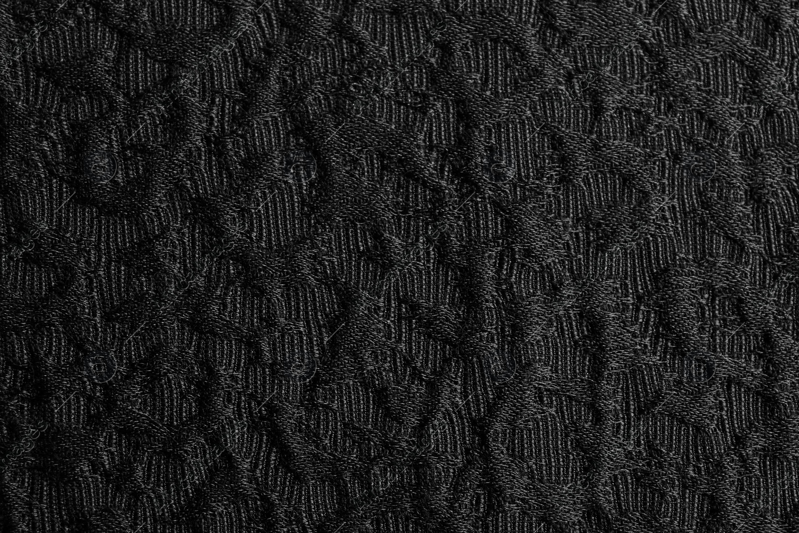 Photo of Textured dark fabric as background, closeup view