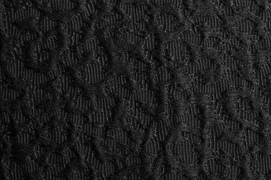 Photo of Textured dark fabric as background, closeup view