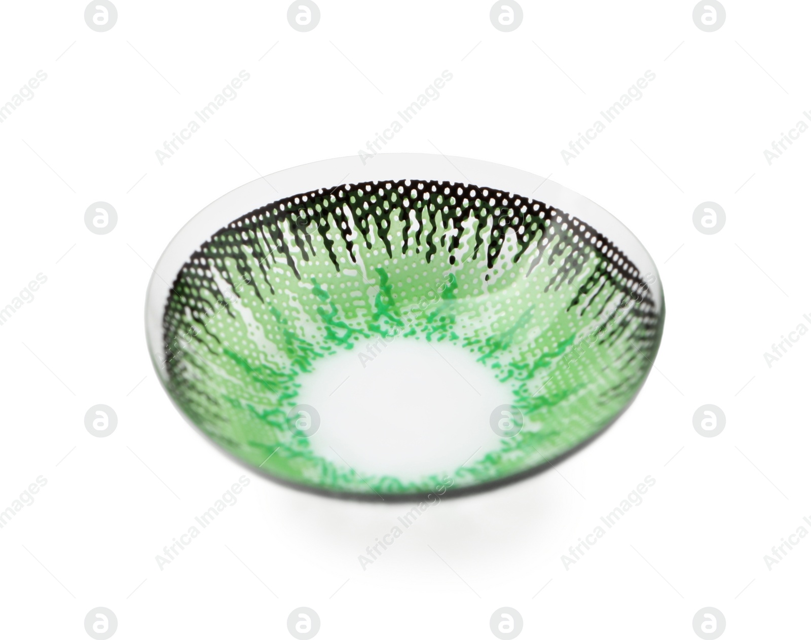 Photo of One green contact lens isolated on white