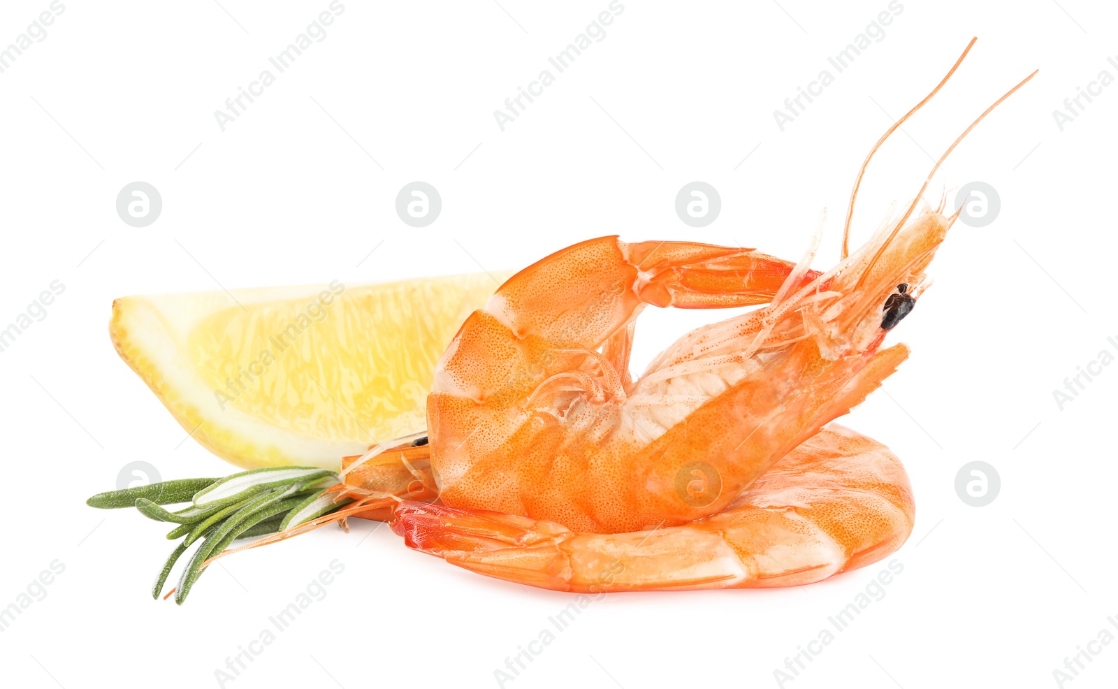 Photo of Delicious cooked shrimps, lemon and rosemary isolated on white