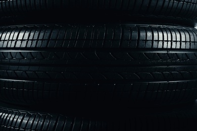 Photo of Stacked car tires, closeup
