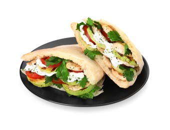 Photo of Plate of delicious pita sandwiches with grilled vegetables and sour cream sauce isolated on white
