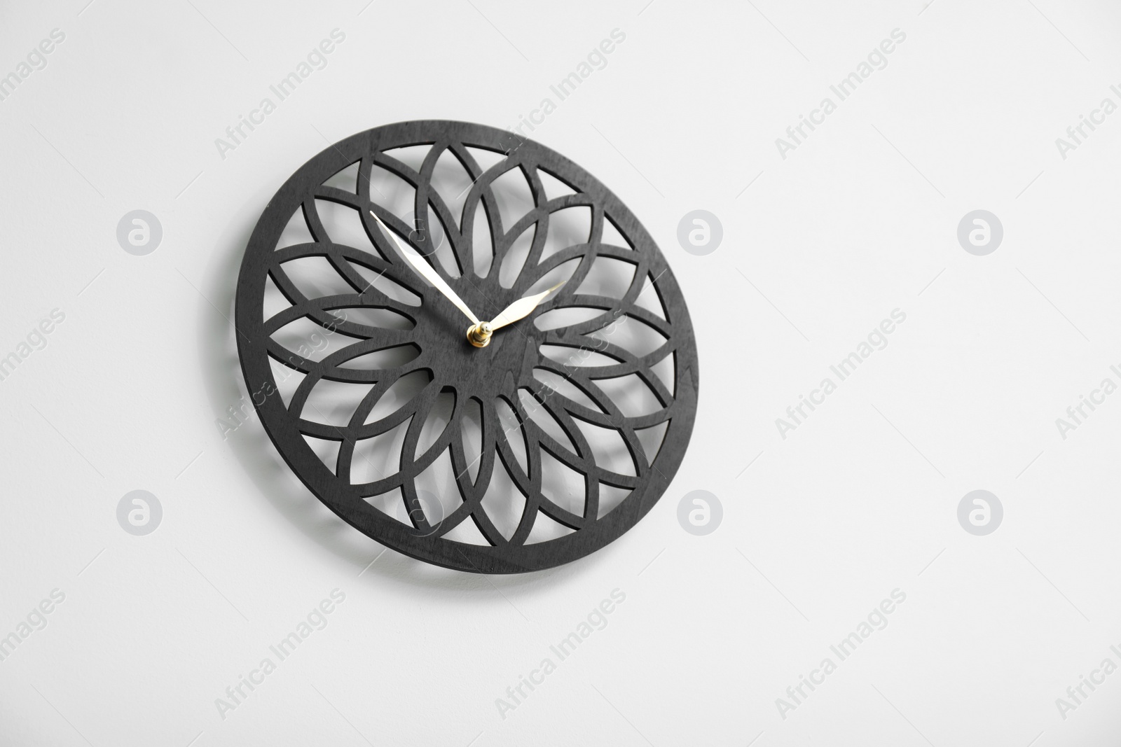 Photo of Stylish clock on white background. Time concept