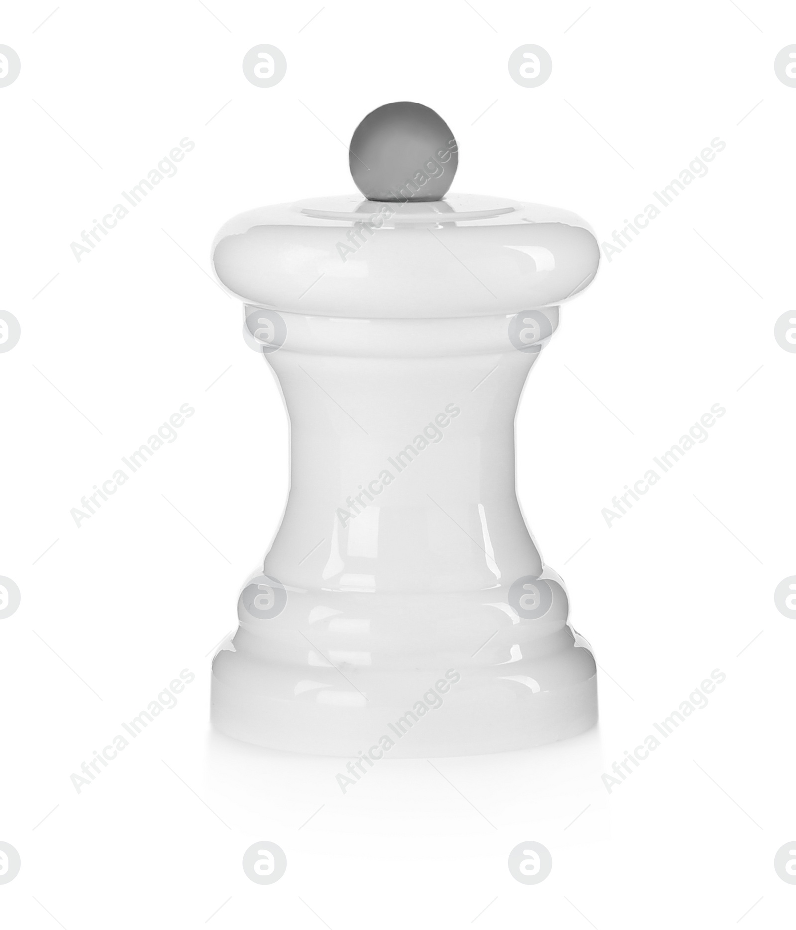 Photo of Stylish ceramic seasoning shaker isolated on white