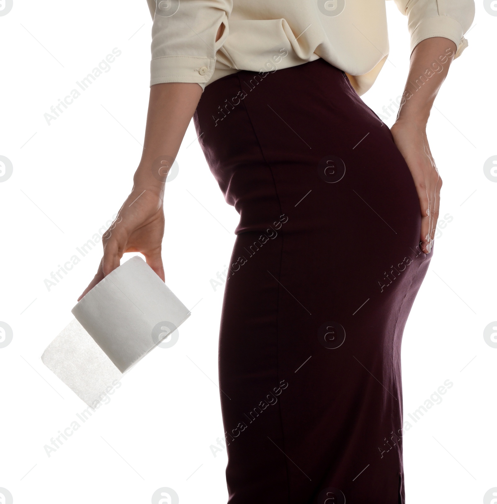 Photo of Woman with toilet paper suffering from hemorrhoid on white background, closeup