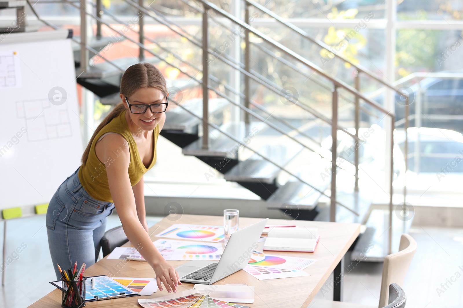 Photo of Professional interior designer at workplace in office