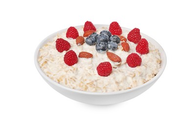 Photo of Tasty boiled oatmeal with berries and almonds in bowl isolated on white