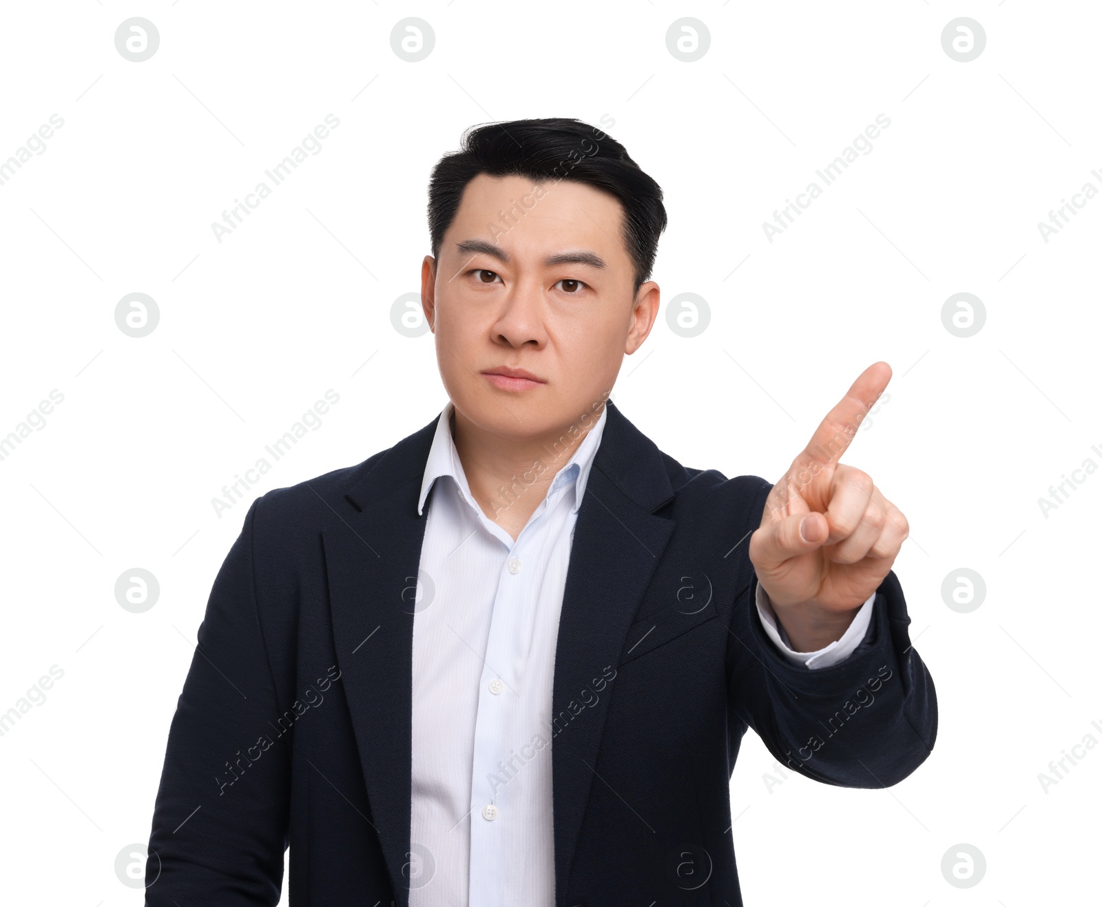 Photo of Angry businessman in suit posing on white background