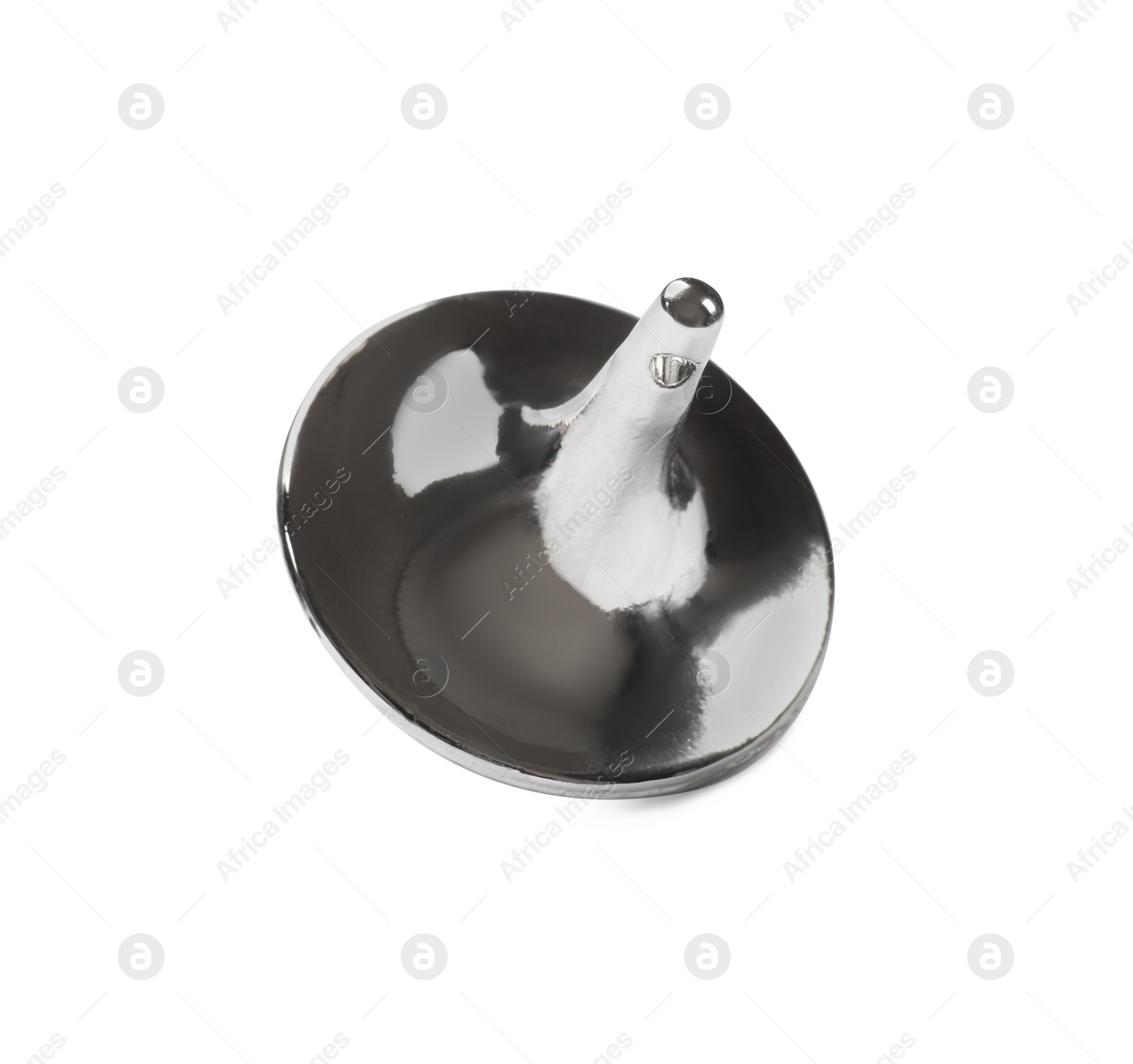 Photo of One silver spinning top on white background