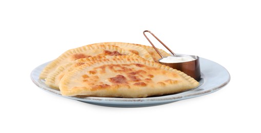Delicious fried chebureki with cheese and sauce isolated on white