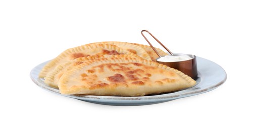 Photo of Delicious fried chebureki with cheese and sauce isolated on white