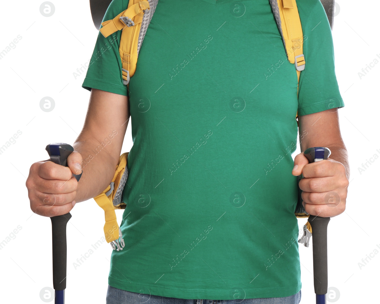 Photo of Male hiker with backpack and trekking poles on white background, closeup