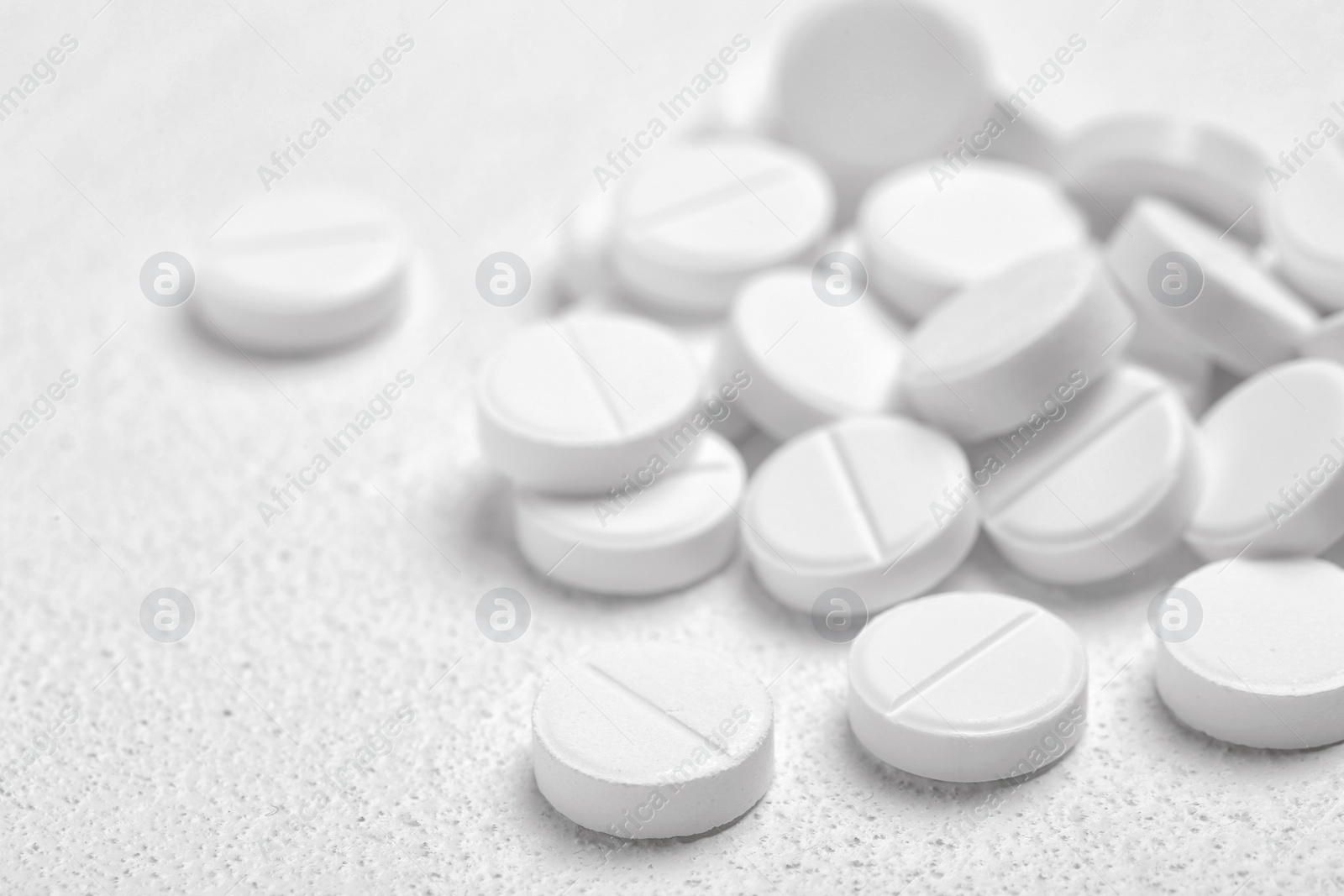 Photo of Pills on white background, closeup