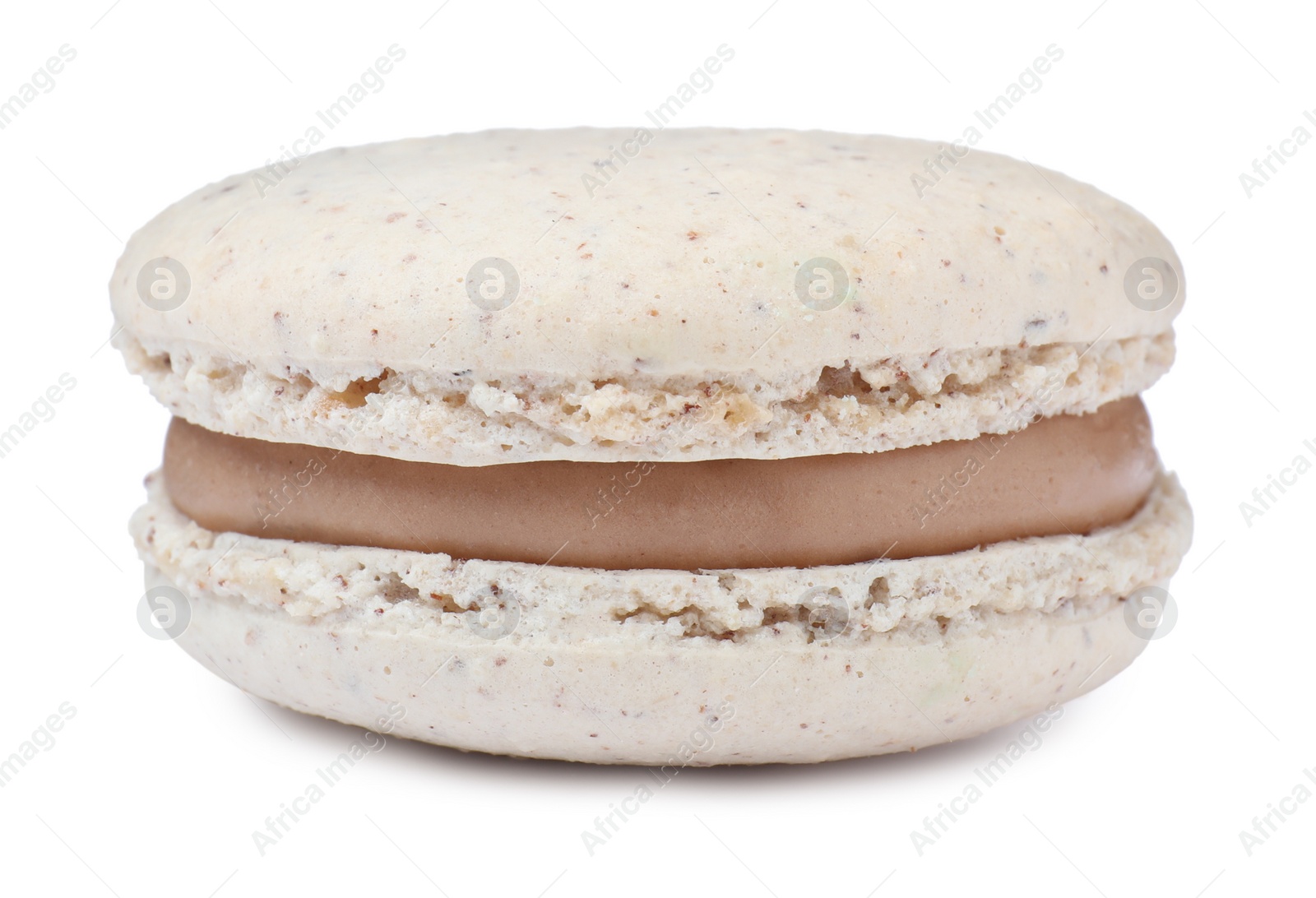 Photo of Beige macaron isolated on white. Delicious dessert