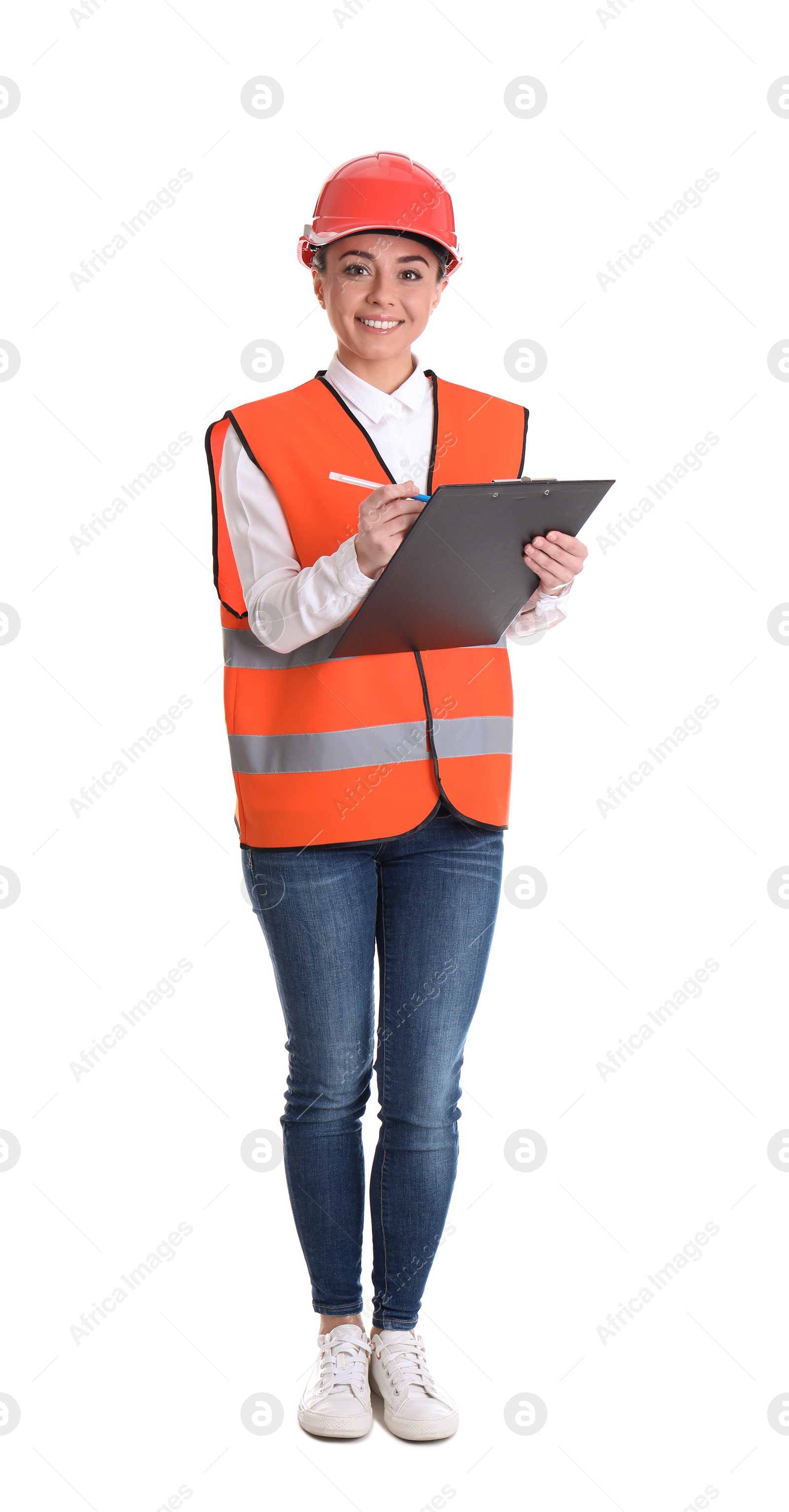 Photo of Female industrial engineer in uniform with clipboard on white background. Safety equipment