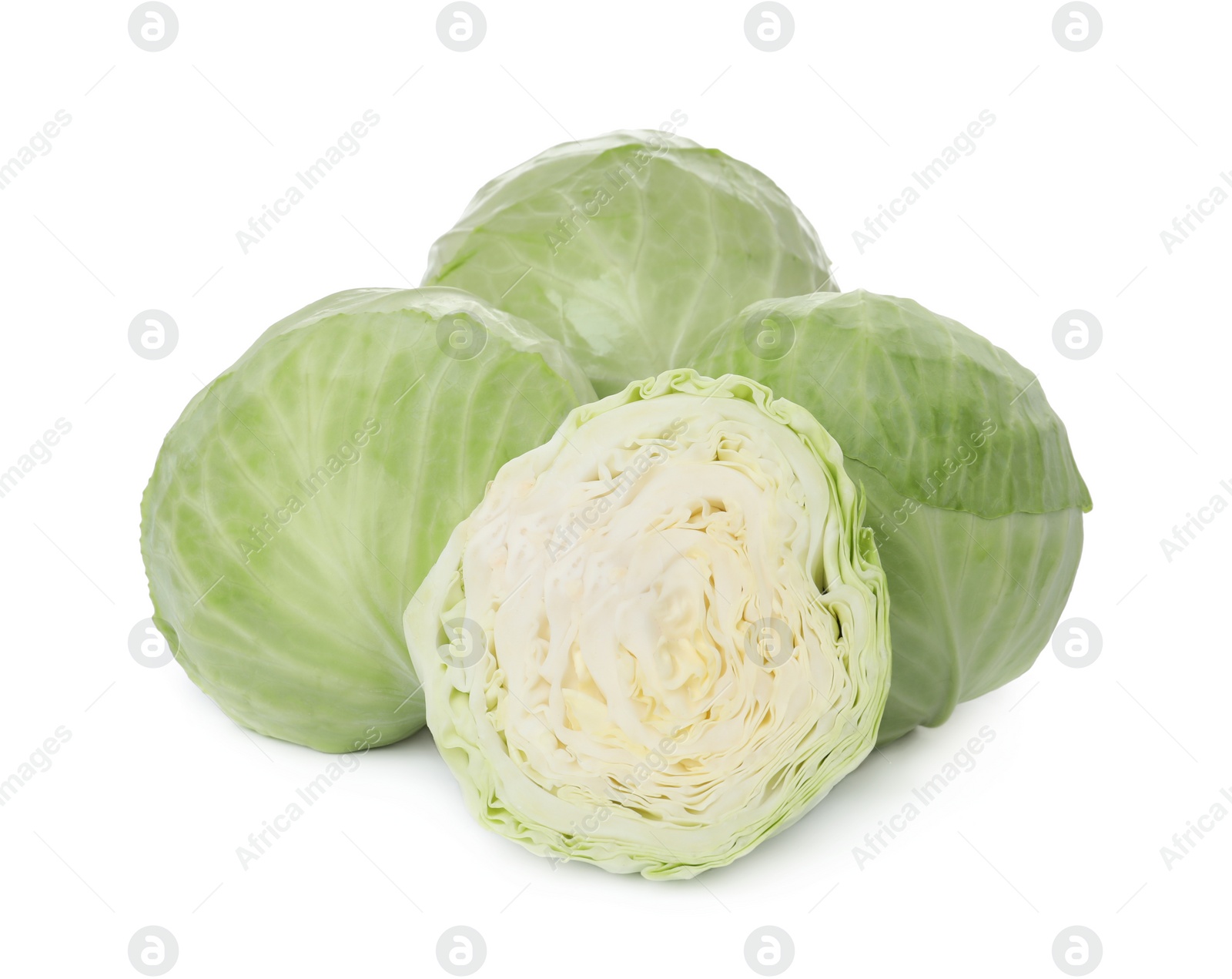 Photo of Whole and cut fresh ripe cabbages on white background