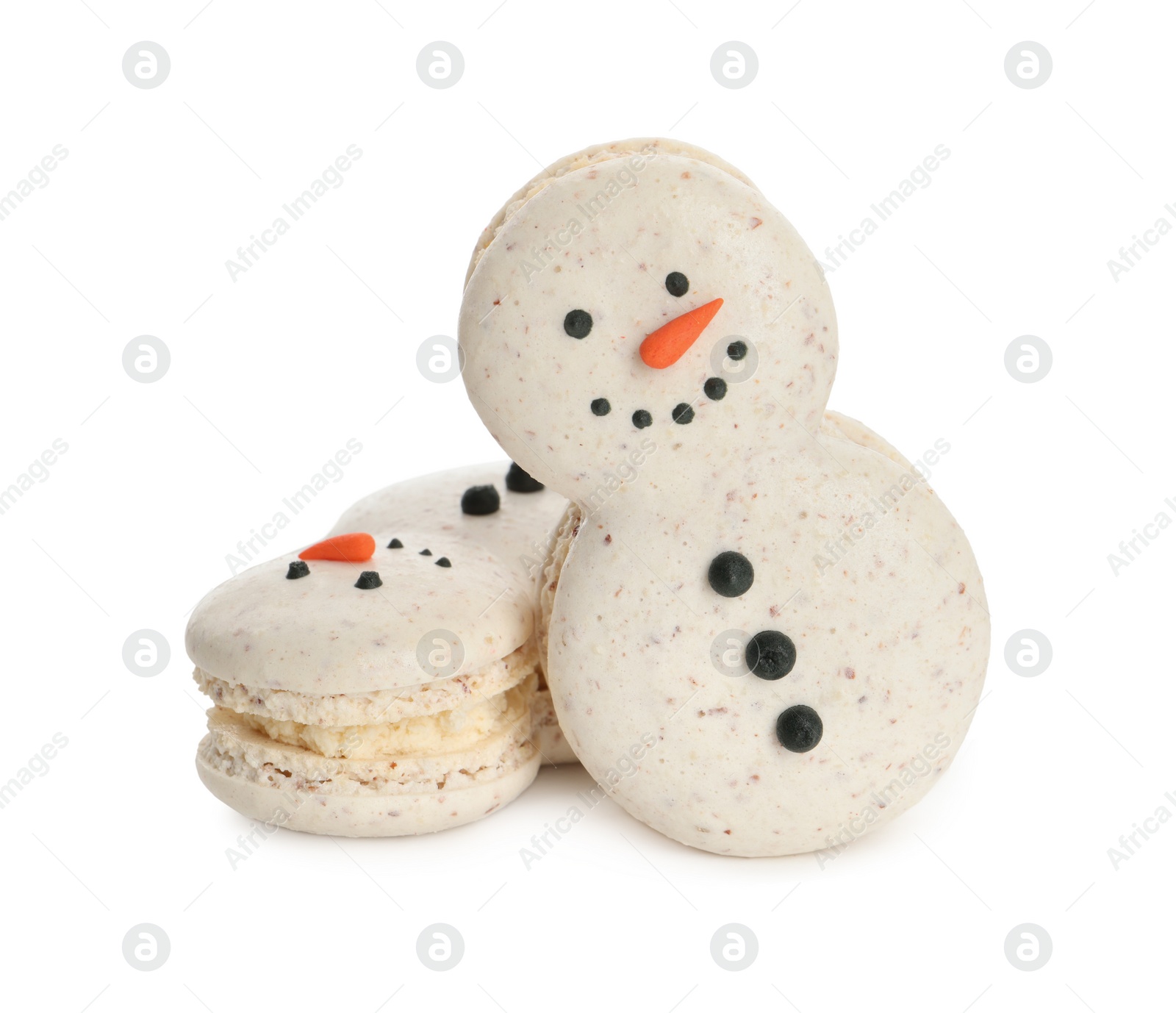 Photo of Beautifully decorated Christmas macarons on white background