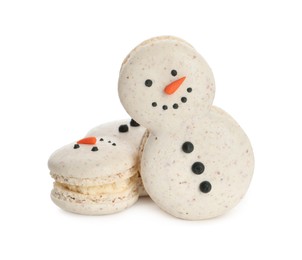 Photo of Beautifully decorated Christmas macarons on white background