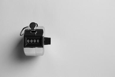 Modern timer on light grey background, top view. Space for text