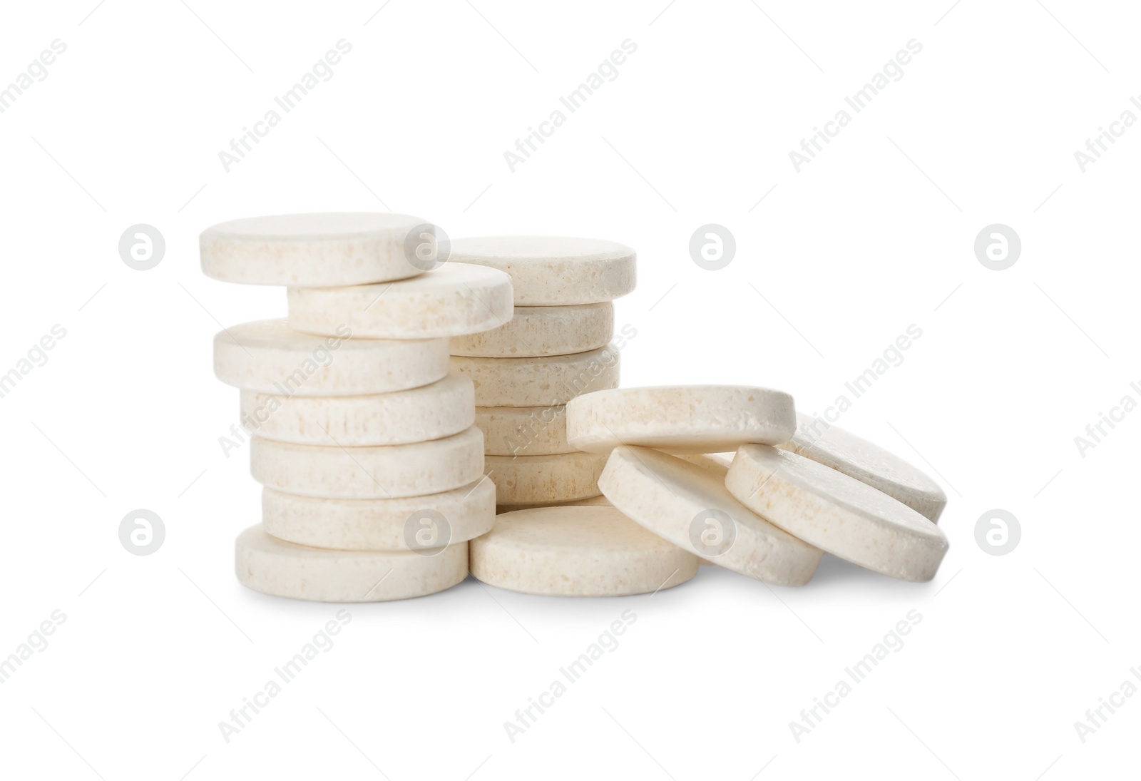 Photo of Pile of vitamin pills on white background