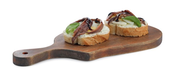 Photo of Delicious bruschettas with anchovies, eggs, basil and sauce on white background