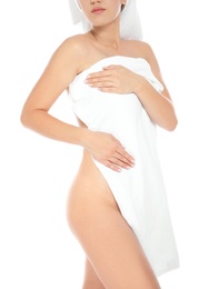 Young sensual woman with towel on white background