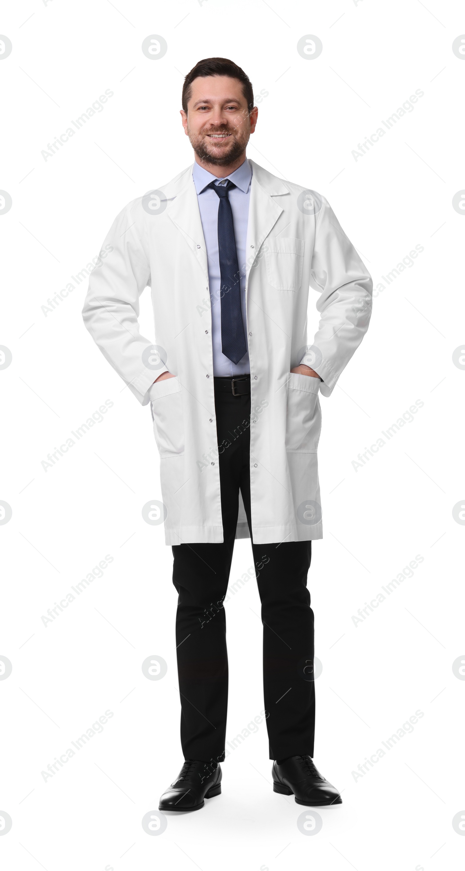 Photo of Full length portrait of smiling doctor isolated on white