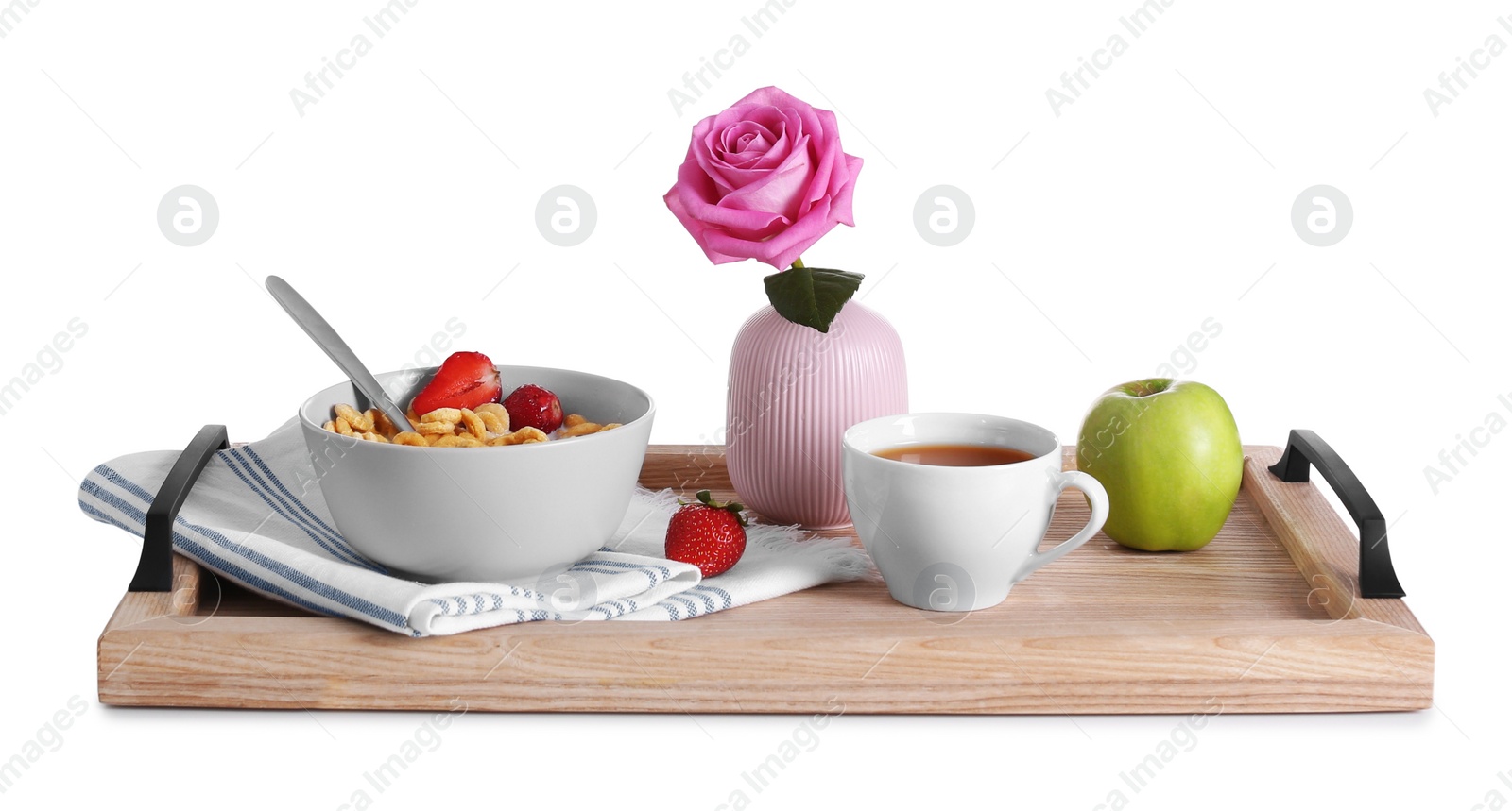 Photo of Wooden tray with delicious breakfast and beautiful flower on white background