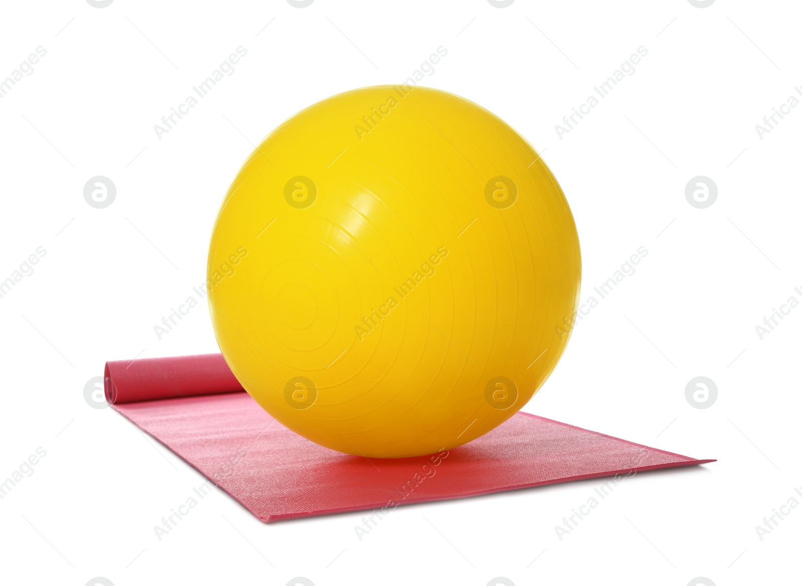 Photo of Fitness ball and yoga mat isolated on white