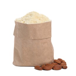 Photo of Paper bag with almond flour and nuts isolated on white