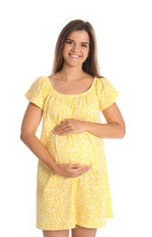 Happy pregnant woman touching her belly on white background