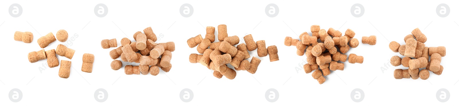 Image of Set with corks of sparkling wine bottles on white background, top view. Banner design