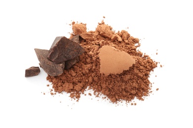 Cocoa powder and pieces of chocolate on white background