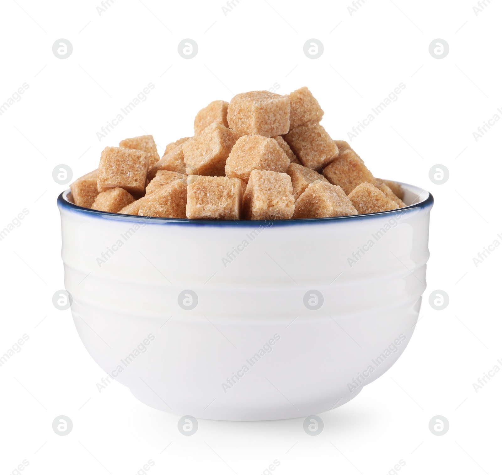 Photo of Bowl of brown sugar cubes isolated on white