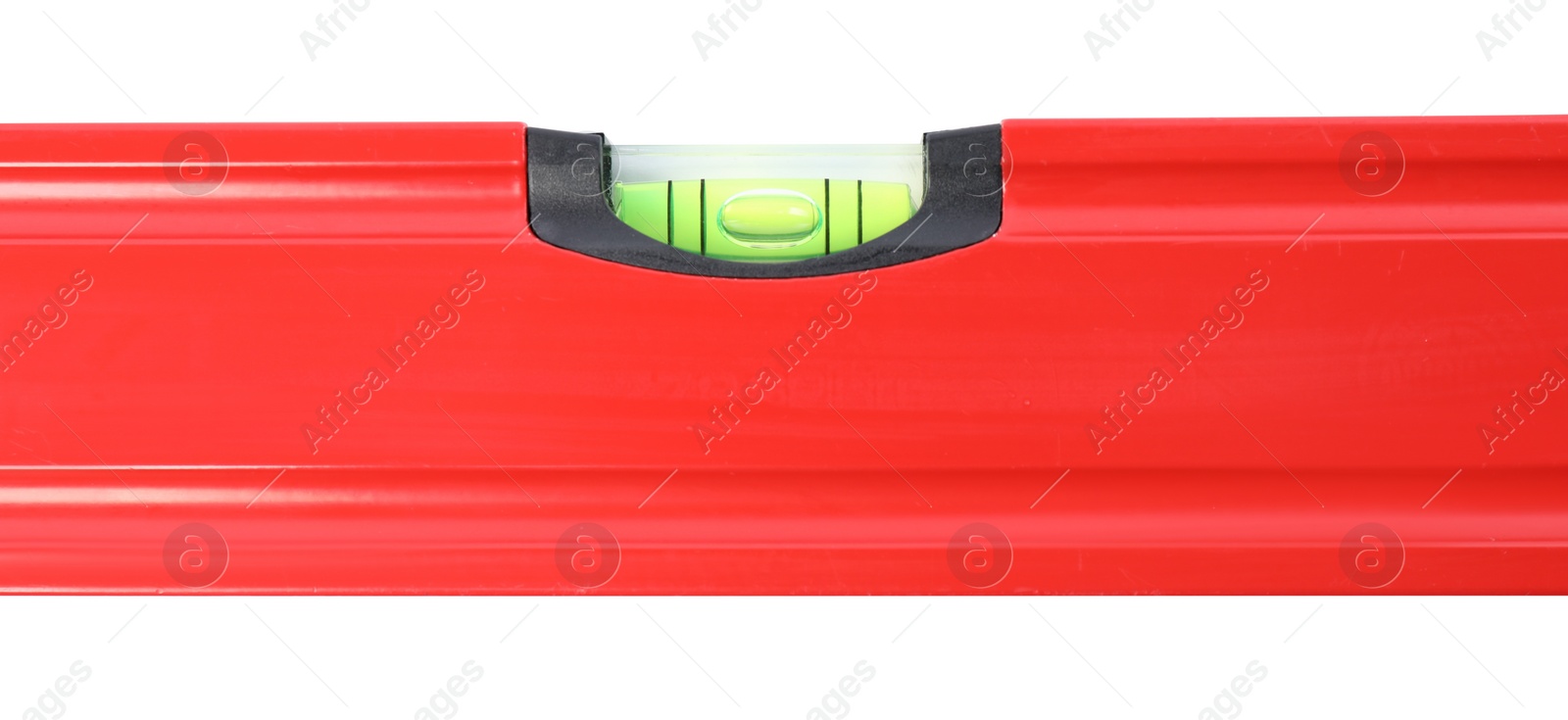 Photo of Red building level isolated on white. Construction tool