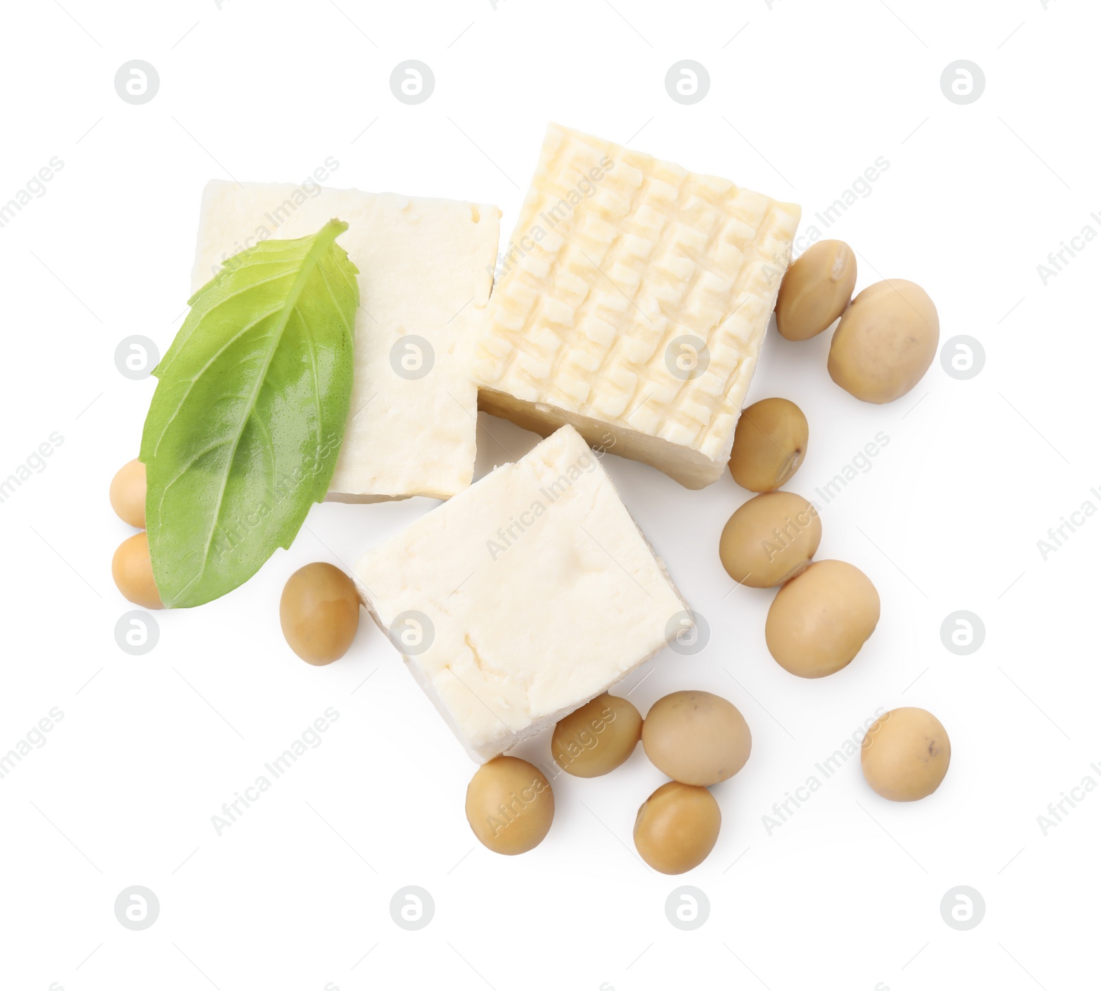 Photo of Delicious tofu cheese, basil and soybeans isolated on white, top view