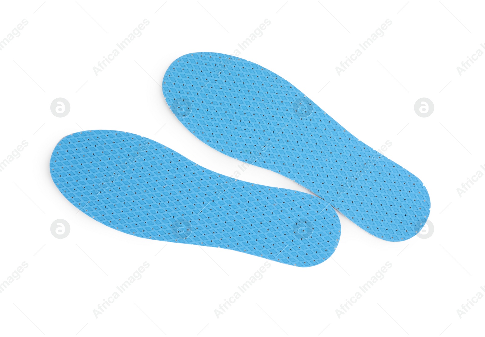 Photo of Pair of insoles on white background, top view