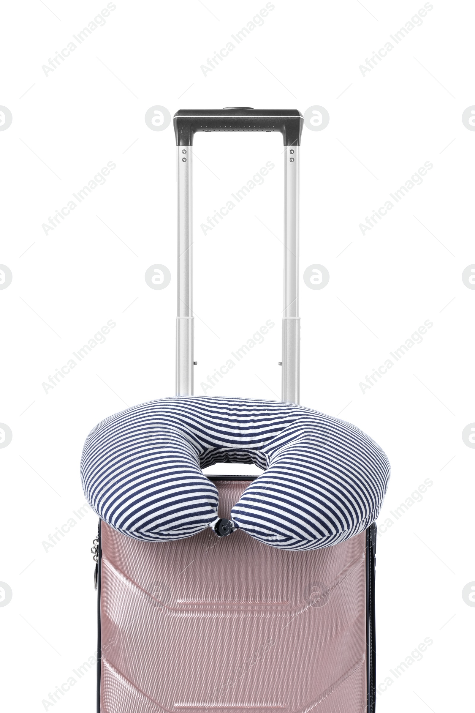 Photo of Soft travel pillow on suitcase isolated on white