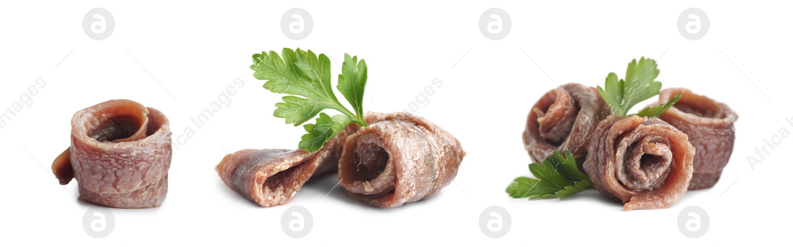 Image of Set with delicious rolled anchovy fillets on white background. Banner design