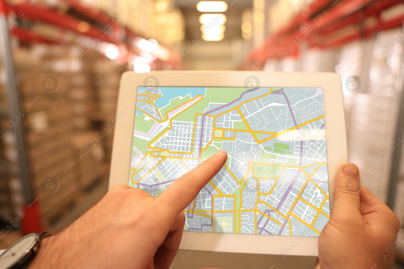 Image of Manager with tablet working at warehouse, closeup. Logistics center