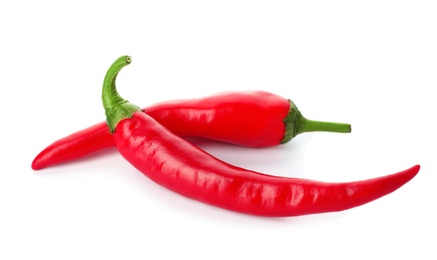 Red hot chili peppers on white background