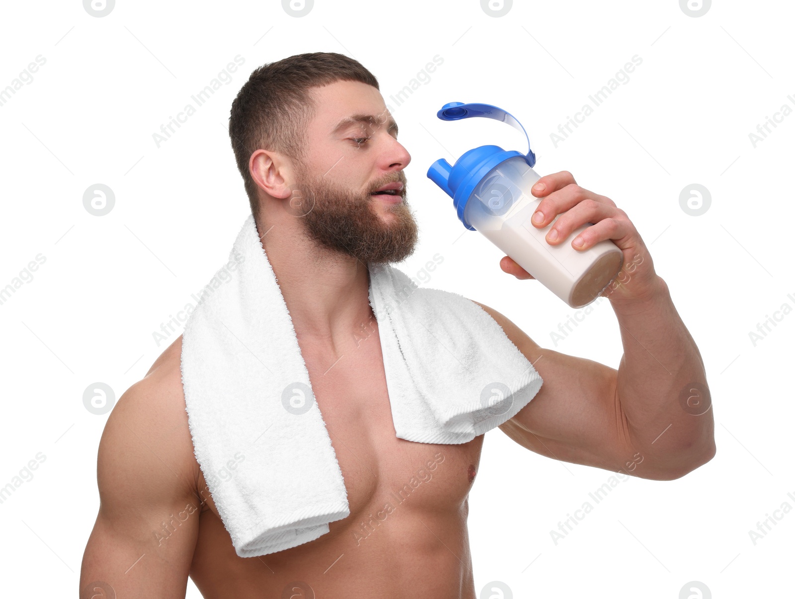 Photo of Young man with muscular body holding shaker of protein and towel on white background